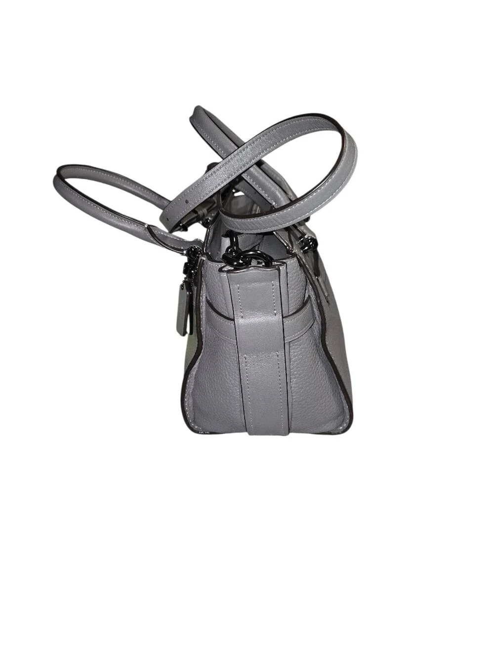 Coach Swagger 27 bag in a grey pebbled leather finish.